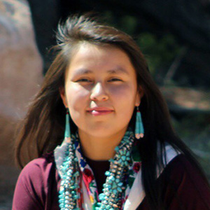 photo of female student with turquoise necklace on