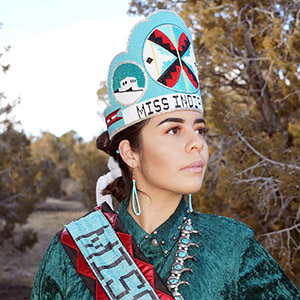 photo of former miss indian unm with crown and sash