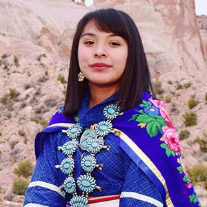 photo of former miss indian unm with crown and sash